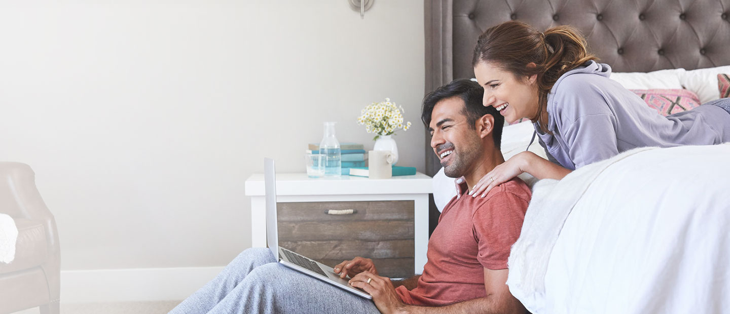 man and woman taking a customer survey at home